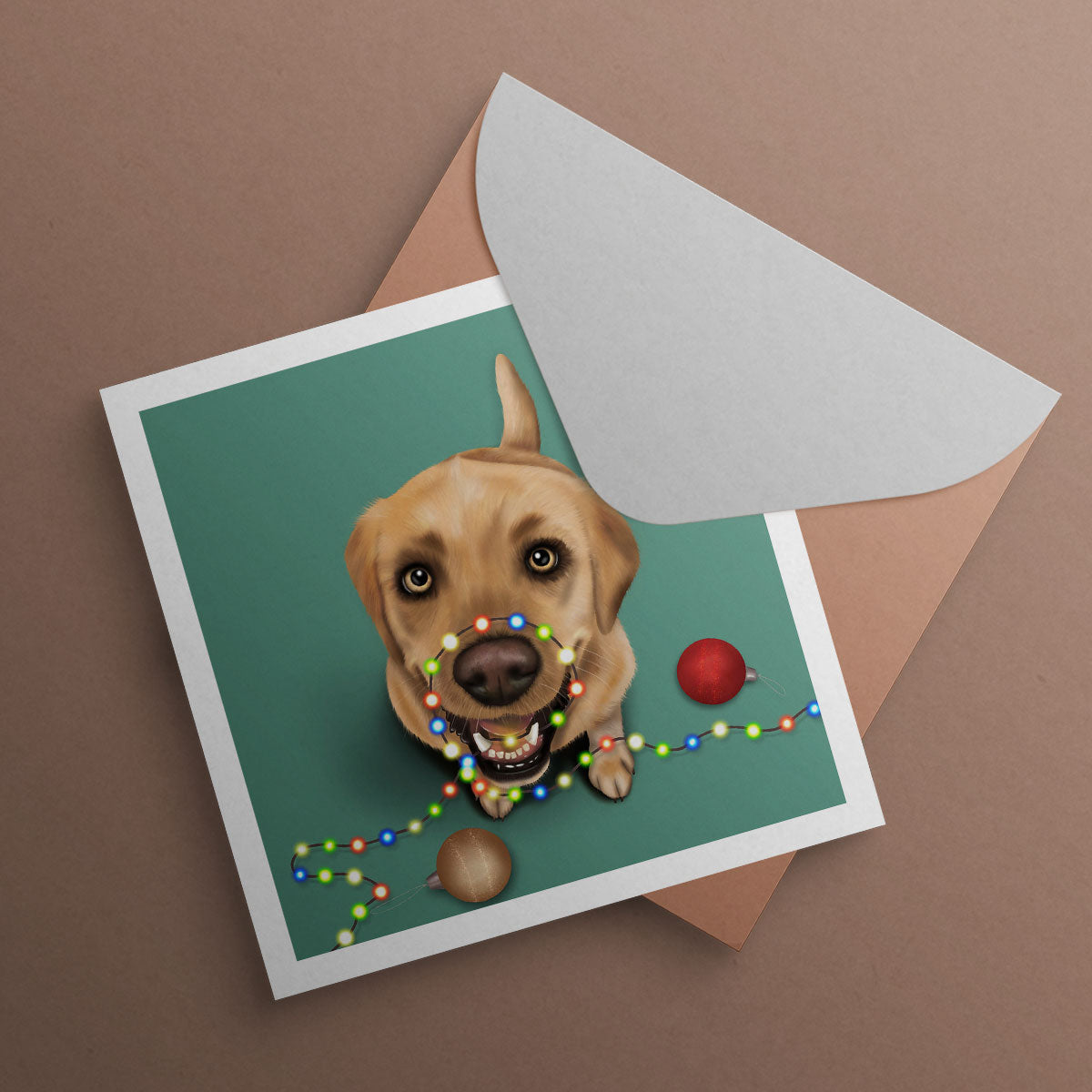 Yellow Labrador holding Christmas tree lights in his mouth. Christmas card illustrated by kitty's Art.