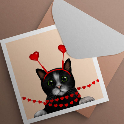 Black and White Cat Wrapped in Hearts Card